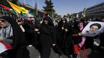 Iranian worshippers chant slogans in an anti-Israeli gathering after their Friday prayer in Tehran, on 19 April 2024. File photo/AP