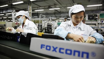 Women factory workers in Foxconn's Apple factory. Representative image. Image Credit: Reuters