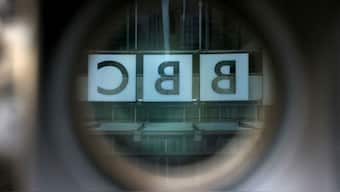 (File) A BBC logo is reflected in the viewfinder of a television camera outside the British Broadcasting Corporation (BBC) headquarters in London. Reuters