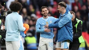 Manchester City's Bernardo Silva, center, celebrates after reaching FA Cup final. AP