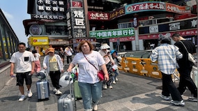Shanghai stocks swing as China pledges fresh stimulus for ailing economy