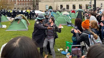 New York Police officers arrest a protester who participated in an encampment on the Columbia University campus. AP