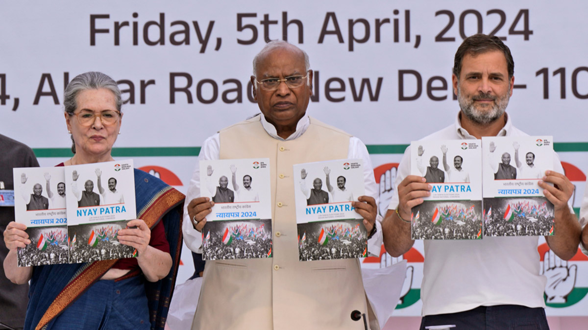 Congress party leaders from left, Sonia Gandhi, Mallikarjun Kharge, and Rahul Gandhi, display copies of party’s election manifesto during a press conference in New Delhi on 5 April, 2024. AP Congress party leaders from left, Sonia Gandhi, Mallikarjun Kharge, and Rahul Gandhi, display copies of party’s election manifesto during a press conference in New Delhi on 5 April, 2024. AP
