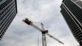 A crane stands between condo buildings in Liberty Village neighbourhood in Toronto, Ontario, Canada. Reuters 