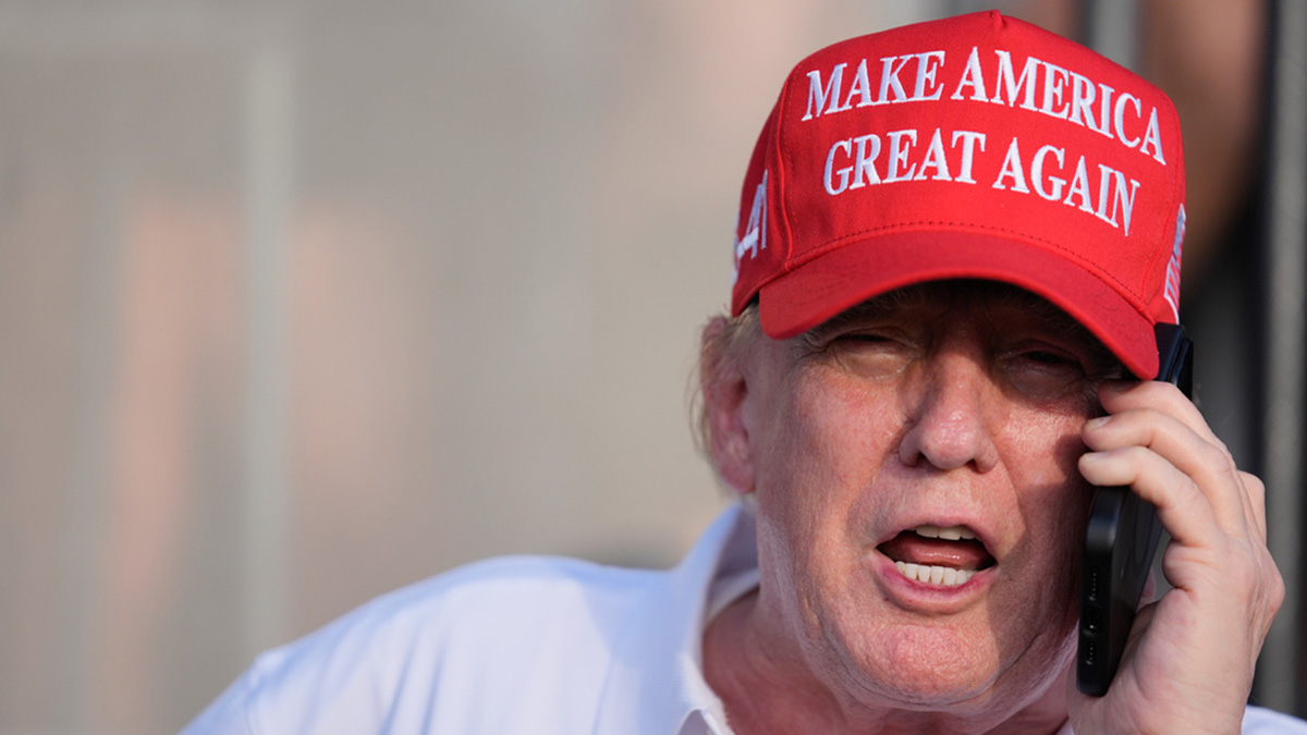 Republican presidential candidate, former President Donald Trump speaks on the phone as he watches play in the final round of LIV Golf Miami, at Trump National Doral Golf Club, on 7 April, 2024, in Doral, Fla. AP Republican presidential candidate, former President Donald Trump speaks on the phone as he watches play in the final round of LIV Golf Miami, at Trump National Doral Golf Club, on 7 April, 2024, in Doral, Fla. AP