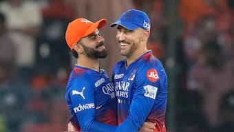 Royal Challengers Bengaluru's Virat Kohli, left, and Faf du Plessis celebrate their win against Sunrisers Hyderabad in IPL 2024. AP