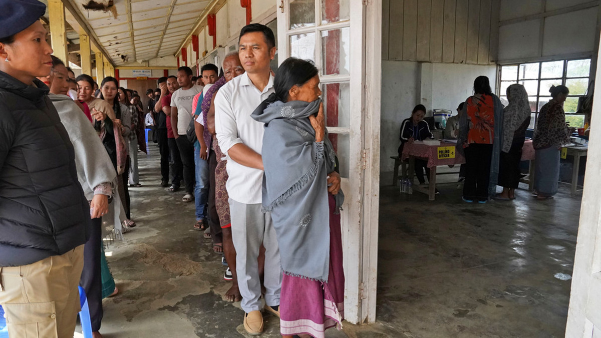 Angami Nagas stand in queues to cast their votes in Chedema village, in Nagaland, on 19 April, 2024. AP Angami Nagas stand in queues to cast their votes in Chedema village, in Nagaland, on 19 April, 2024. AP