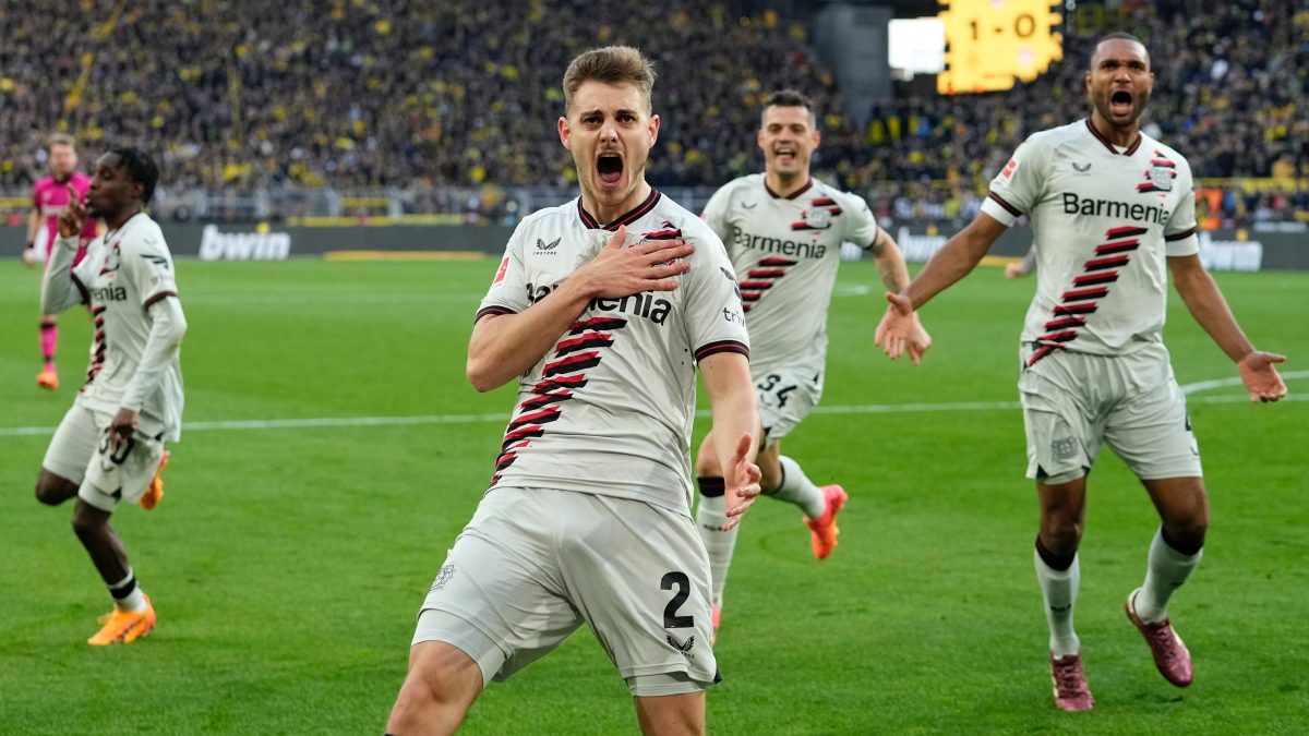 Bayer Leverkusen's Josip Stanisic (C) scored in the 97th minute to see the Bundesliga champions remain unbeaten this season following a 1-1 draw with Borussia Dortmund. AP Bayer Leverkusen's Josip Stanisic (C) scored in the 97th minute to see the Bundesliga champions remain unbeaten this season following a 1-1 draw with Borussia Dortmund. AP