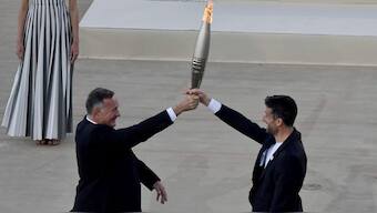 On Saturday the Olympic flame will board the Belem, a French three-masted sailing ship, built in 1896, to be transported to France. AP