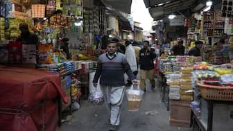 People visit a market to buy groceries and other stuff, in Rawalpindi, Pakistan. File image/AP