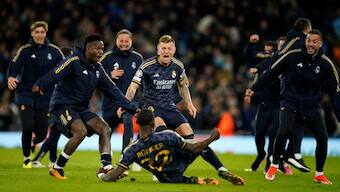Real Madrid players celebrate after wining the Champions League quarterfinal second leg match against Manchester City. AP
