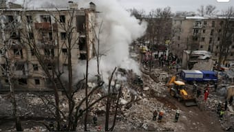 Rescuers work at a site of a residential building heavily damaged during a Russian missile attack, amid Russia's attack on Ukraine, in Kharkiv, Ukraine. File Photo- Reuters 