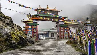 Buddhist and tribal architecture as seen in this colourful gateway to Tawang at Sela Pass 13,700 ft above sea level in Arunachal Pradesh. Shutterstock