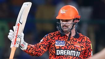 Sunrisers Hyderabad opener Travis Head celebrates after completing his half-century in just 16 deliveries against Delhi Capitals at the Arun Jaitley Stadium. AP