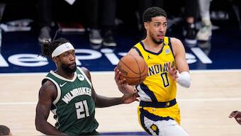 Indiana Pacers guard Tyrese Haliburton (right) makes a pass in front of Milwaukee Bucks guard Patrick Beverley during the second half in Game 2 in an NBA basketball first-round playoff series. AP