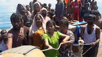Rohingya refugees being rescued in the waters of West Aceh. Reuters/Representative image