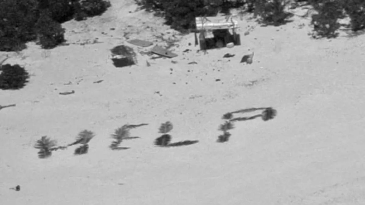 Image of the HELP sign made alongside the shade, shared by coastguard. Source: X Image of the HELP sign made alongside the shade, shared by coastguard. Source: X