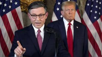Speaker of the House Mike Johnson, R-La., speaks as Republican presidential candidate Donald Trump listens during a news conference, Friday, April 12, 2024, at Mar-a-Lago in Palm Beach, Fla. FIle Image: AP