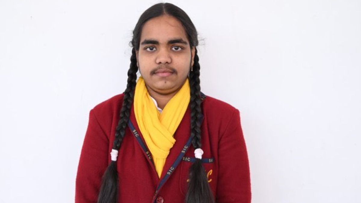Prachi Nigam, who topped Class 10 UP Board exams, has received immense support on the internet after being trolled for her facial hair. Image Courtesy: X/@GaganPratapMath Prachi Nigam, who topped Class 10 UP Board exams, has received immense support on the internet after being trolled for her facial hair. Image Courtesy: X/@GaganPratapMath