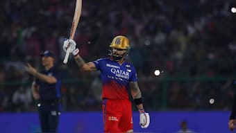 Royal Challengers Bengaluru's Virat Kohli celebrates after completing his eighth IPL hundred during the IPL 2024 match against Rajasthan Royals in Jaipur. AP