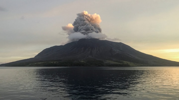 Volcano eruption in eastern Indonesia spews miles-high ash tower; Officials warn people to keep away