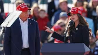 US President-elect Donald Trump and North Dakota Governor Kristi Noem. Source: AFP