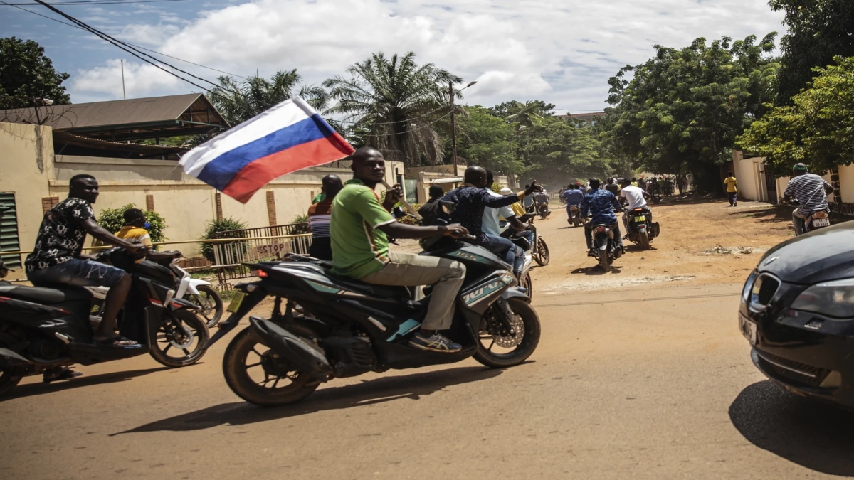 Supporters of Capt. Ibrahim Traore parade waving a Russian flag in the streets of Ouagadougou, Burkina Faso. Source: AP / File Photo Supporters of Capt. Ibrahim Traore parade waving a Russian flag in the streets of Ouagadougou, Burkina Faso. Source: AP / File Photo