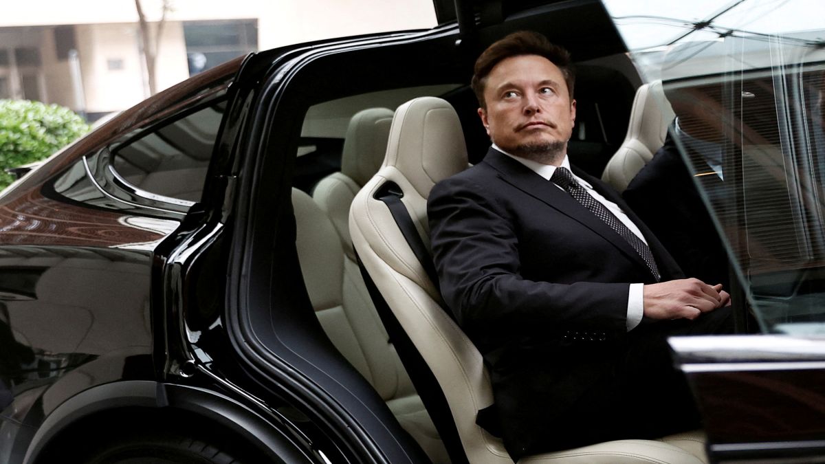 Tesla Chief Executive Officer Elon Musk gets in a Tesla car as he leaves a hotel in Beijing. The company delivered 386,810 electric vehicles over the first three months of 2024, falling wildly short of Wall Street’s expectations. File image/Reuters Tesla Chief Executive Officer Elon Musk gets in a Tesla car as he leaves a hotel in Beijing. The company delivered 386,810 electric vehicles over the first three months of 2024, falling wildly short of Wall Street’s expectations. File image/Reuters