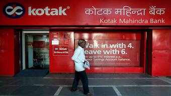 A man walks past the Kotak Mahindra Bank branch in New Delhi. File image/Reuters