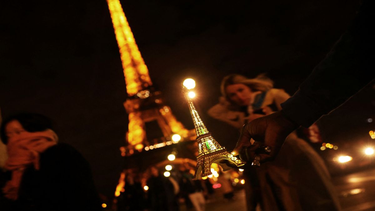 A man sells miniatures of the Eiffel Tower to tourists in Paris. The French capital is often too crowded because of overtourism and is also expensive. Reuters A man sells miniatures of the Eiffel Tower to tourists in Paris. The French capital is often too crowded because of overtourism and is also expensive. Reuters
