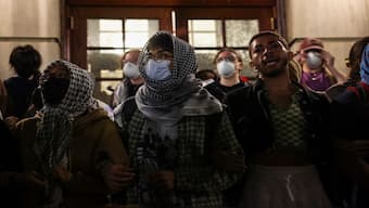 Protesters link arms outside Hamilton Hall barricading students inside the building at Columbia University, despite an order to disband the protest encampment supporting Palestinians or face suspension, during the ongoing conflict between Israel and the Palestinian group Hamas, in New York City. Reuters