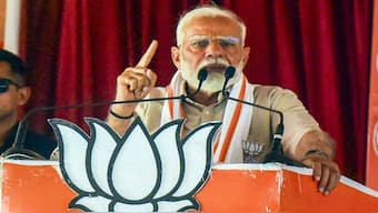 Prime Minister Narendra Modi addresses a public meeting for Lok Sabha elections, in Aligarh. At the meet, he reiterated his previous claim that the Congress was planning to seize citizens' properties. PTI