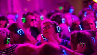 Festival goers dance at the silent disco stage during Open'er music Festival in Gdynia, Poland. Reuters
