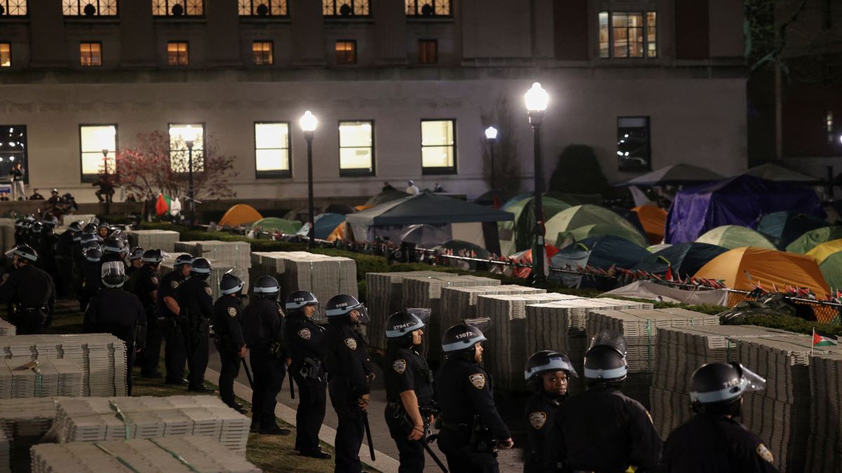 Police stand guard near an encampment of protesters supporting Palestinians on the grounds of Columbia University, during the ongoing conflict between Israel and the Palestinian group Hamas, in New York City, US. Reuters Police stand guard near an encampment of protesters supporting Palestinians on the grounds of Columbia University, during the ongoing conflict between Israel and the Palestinian group Hamas, in New York City, US. Reuters