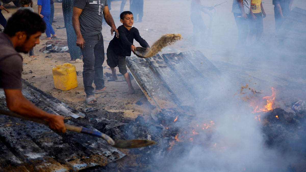 Palestinians put out a fire at the site of an Israeli strike on an area designated for displaced people, in Rafah, in the southern Gaza Strip on 27 May  2024. Reuters Palestinians put out a fire at the site of an Israeli strike on an area designated for displaced people, in Rafah, in the southern Gaza Strip on 27 May  2024. Reuters