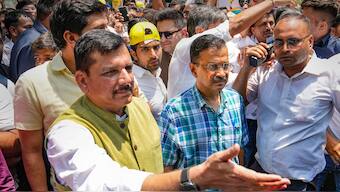 Delhi CM and AAP convenor Arvind Kejriwal and Sanjay Singh during a protest march, in New Delhi, on 19 May, 2024. PTI