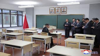 In this photo provided by the North Korean government, North Korean leader Kim Jong Un, left, inspects a class room of a newly built central cadres training school in Pyongyang, North Korea. AP