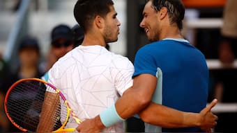 Carlos Alcaraz (L) and Rafael Nadal (R) could team up for Spain at the Paris Olympics, which will be played at Roland Garros. Reuters file photo
