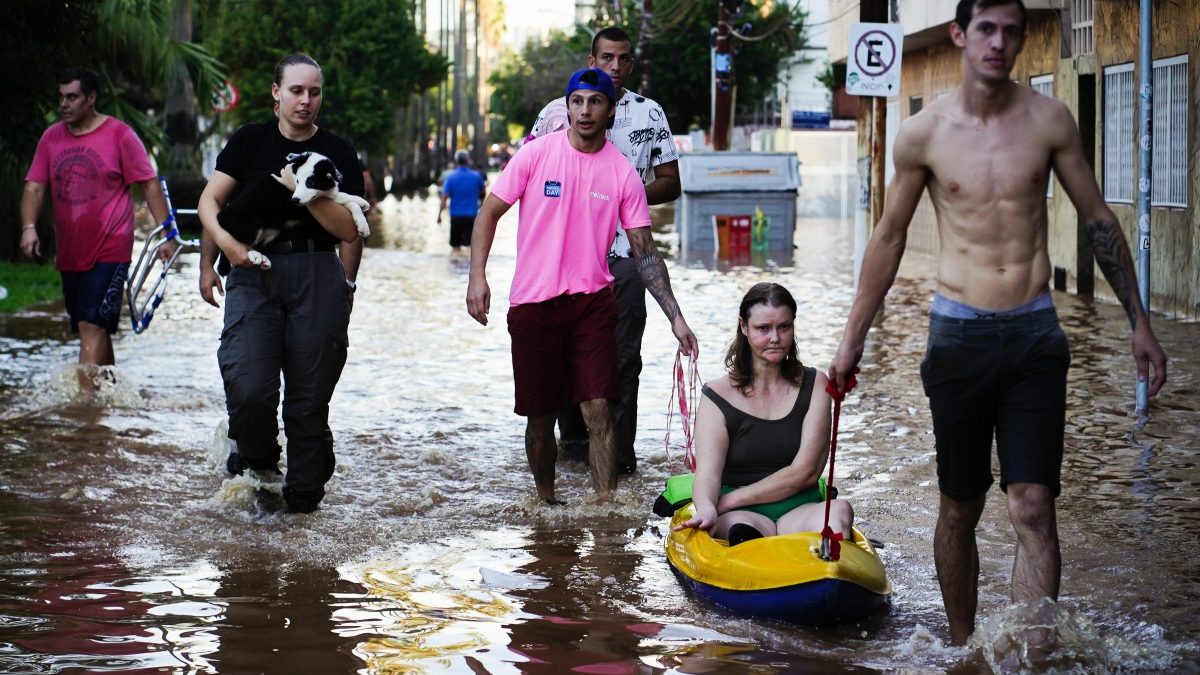 A woman is rescued from an area flooded by heavy rains in Porto Alegre, Rio Grande do Sul state, Brazil. AP A woman is rescued from an area flooded by heavy rains in Porto Alegre, Rio Grande do Sul state, Brazil. AP