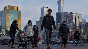 China is trying hard to walk out of its economic crisis. AP