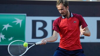 Daniil Medvedev returns the ball to Tommy Paul at the Italian Open tennis tournament in Rome. AP