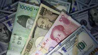 There is twice as much dollars lying all around the world than all other currencies put together. Image:  REUTERS