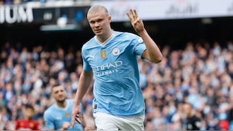 Erling Haaland scored four goals as Manchester City thrashed Wolves to stay within one point of Arsenal in the Premier League. AP