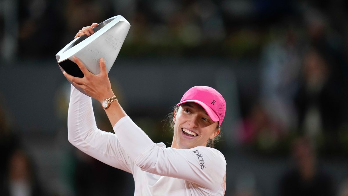 Iga Swiatek holds the trophy after winning the Madrid Open title at Caja Magica in Madrid. AP Iga Swiatek holds the trophy after winning the Madrid Open title at Caja Magica in Madrid. AP