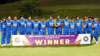 The India women's cricket team poses with the winners' trophy after sweeping the five-match T20I series against Bangladesh in Sylhet on Thursday, 9 May. Image credit: X/@BCBtigers