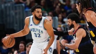 Minnesota Timberwolves center Karl-Anthony Towns, left, looks to drive to the basket as Denver Nuggets guard Jamal Murray, center, and forward Aaron Gordon defend. AP