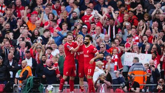 Liverpool beat Spurs to keep themselves mathematically in the hunt for the English Premier League title. AP