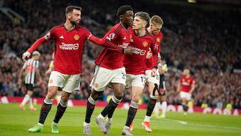 Manchester United players celebrate after scoring against Newcastle United in the English Premier League. AP
