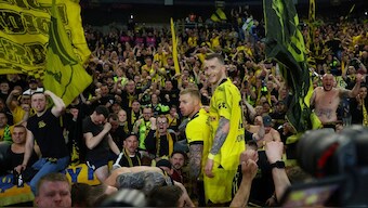 Marco Reus celebrates with travelling Borussia Dortmund fans after they progressed to the UEFA Champions League final at the expense of Paris Saint-Germain. Reuters