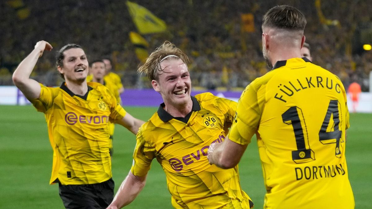 Dortmund's Niclas Fuellkrug, right, celebrates after scoring the winner against Paris Saint-Germain. AP Dortmund's Niclas Fuellkrug, right, celebrates after scoring the winner against Paris Saint-Germain. AP